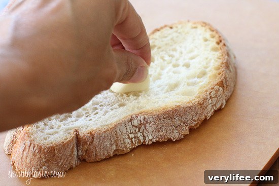 Authentic Spanish Tomato Bread Recipe (Pan con Tomate) 5 Close up of pan con tomate showing texture and tomato