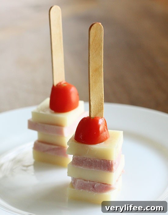 Ham, cheese and tomato on mini skewers