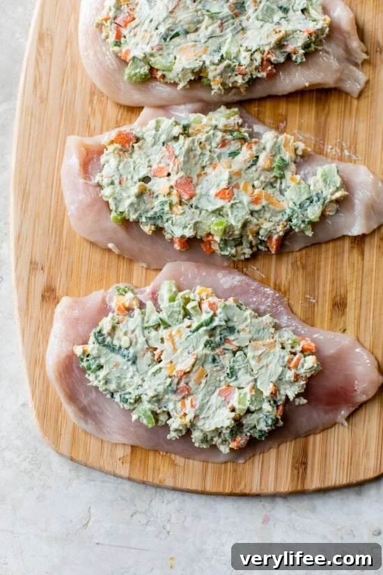 Buffalo Chicken Stuffed Breasts with Creamy Cheese Filling 5 chicken breast with cream cheese and veggies