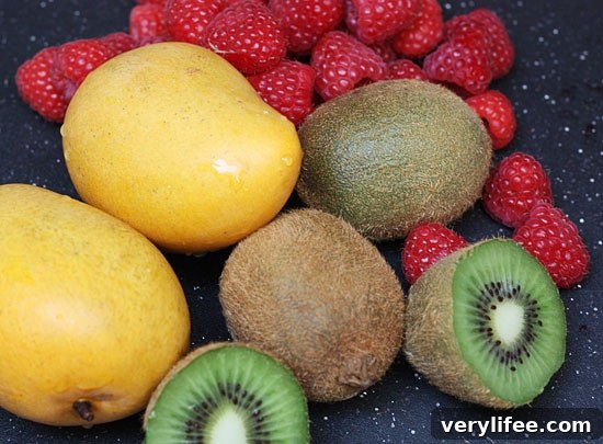 Hot summer's day? No problem, cool off with these homemade frozen fruit pops made with fresh mango, kiwi, and raspberry fruit puree.