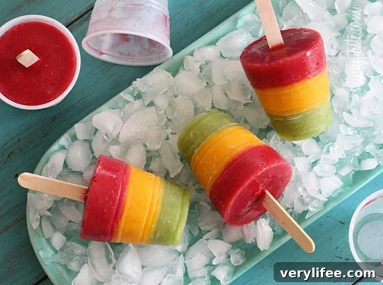 Hot summer's day? No problem, cool off with these homemade frozen fruit pops made with fresh mango, kiwi, and raspberry fruit puree.