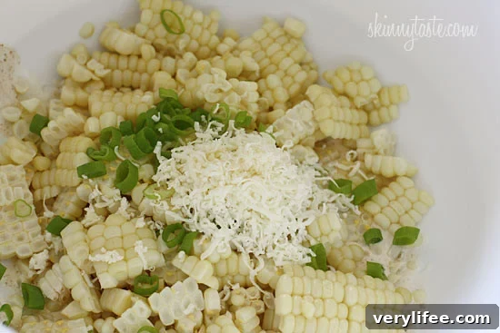 Warm Mexican Street Corn Salad with Cotija and Lime 5 Sweet summer corn lightly coated with lime infused mayonnaise, a touch of hot chili powder and cojita cheese. Also known as the Mexican street corn salad, elote