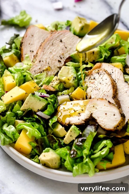 Grilled Chicken pairs beautifully with avocados and mangoes in this delicious salad, perfect for those warmer nights you don't want to heat up the kitchen.