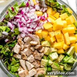 Grilled Chicken pairs beautifully with avocados and mangoes in this delicious salad