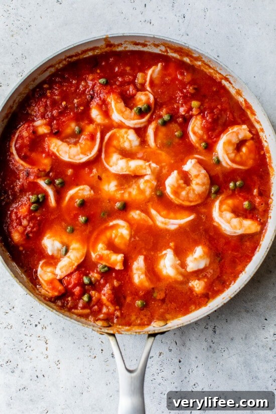 Spicy Shrimp Fra Diavolo with Linguine 6 shrimp and capers in tomato sauce