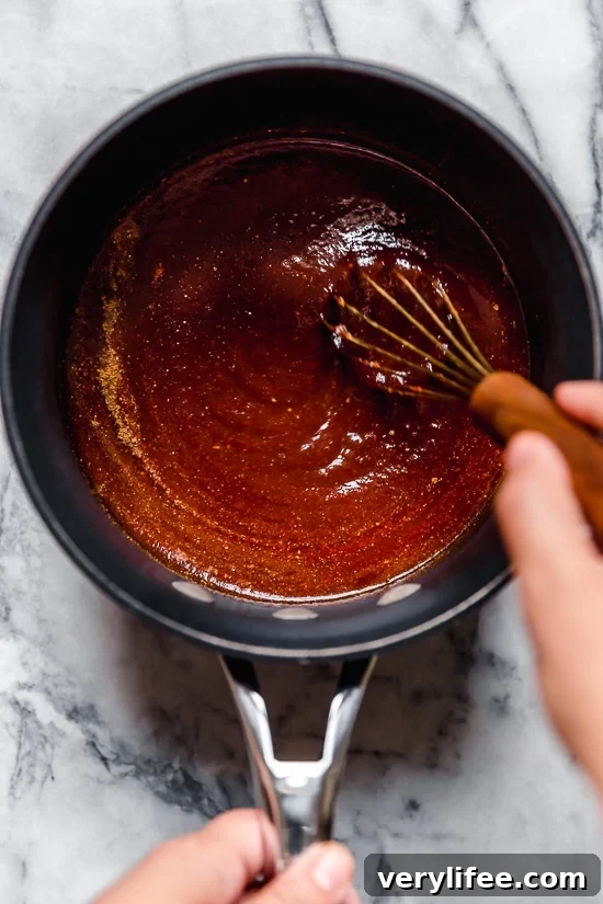 Authentic Kansas City Style BBQ Sauce Recipe 5 Homemade sweet and spicy Kansas City BBQ sauce made with tomato sauce, honey, molasses, vinegar and spices.