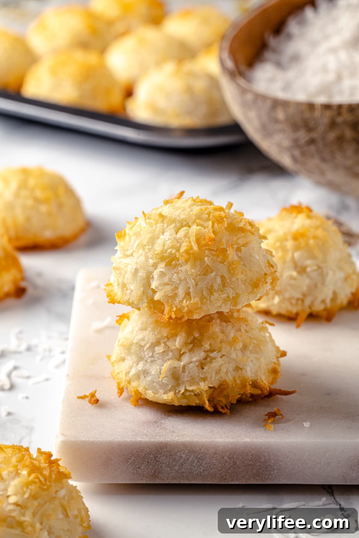 Two coconut macaroons stacked on each other