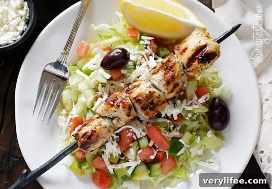 Marinated chunks of grilled chicken breast served over a bed of lettuce with feta, fresh diced tomatoes, cucumbers, green peppers, black olives, red onions, parsley and dill tossed in olive oil and fresh lemon juice.