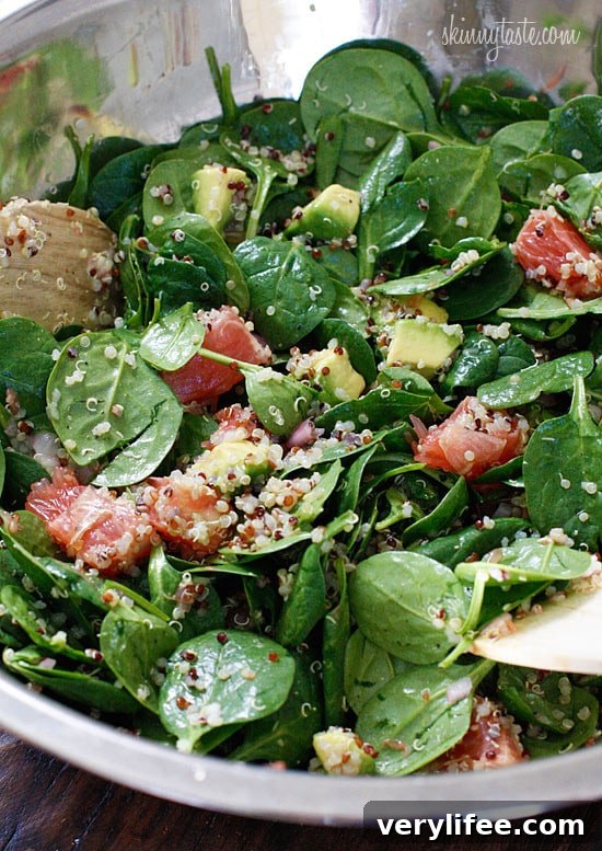 Finished quinoa salad with spinach grapefruit and avocado