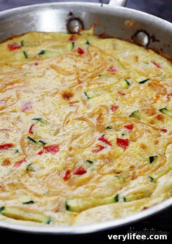 Caramelized Onion, Red Pepper and Zucchini Skillet Frittata 8 Caramelized onions, sauteed red bell peppers and zucchini combined create a winning egg frittata breakfast dish.