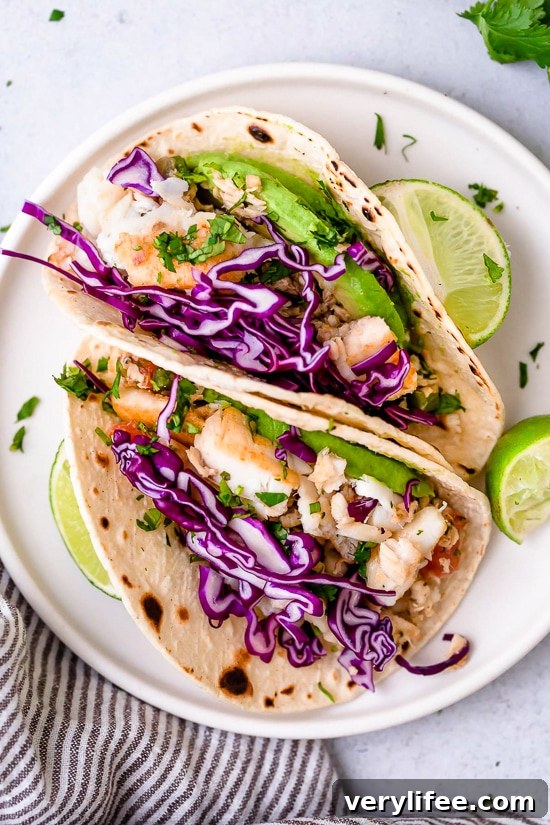 Cilantro Lime Fish Tacos Recipe 4 These easy Cilantro Lime Fish Tacos are made with flaky white fish, tomatoes, jalapeños, cilantro and lime topped with avocado.