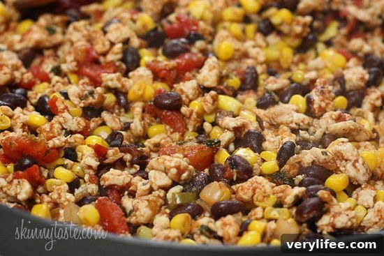 Skinny potato skins loaded Santa Fe style with mildly spiced turkey, black beans, corn and tomatoes topped with cheese - you won't be able to stop at just one!