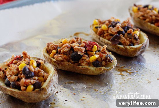 Skinny potato skins loaded Santa Fe style with mildly spiced turkey, black beans, corn and tomatoes topped with cheese - you won't be able to stop at just one!