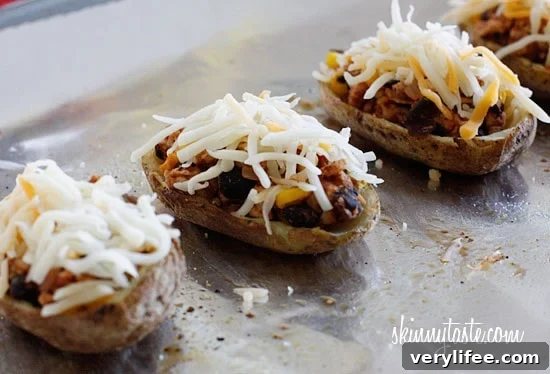 Skinny potato skins loaded Santa Fe style with mildly spiced turkey, black beans, corn and tomatoes topped with cheese - you won't be able to stop at just one!