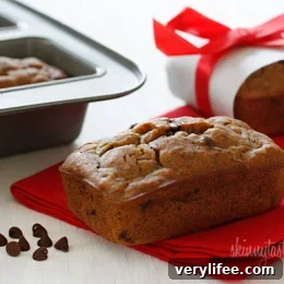Whole wheat mini banana bread made with ripe bananas and chocolate chips are sure to leave a smile on anyone's face.