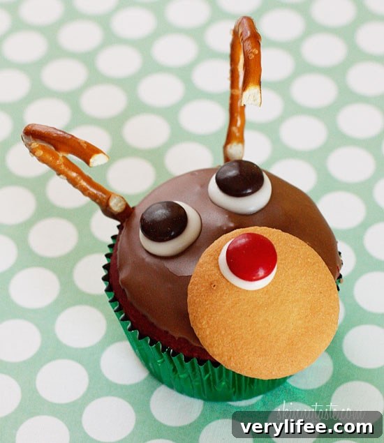 Red velvet yogurt cupcakes topped with a chocolate glaze. These festive reindeer cupcakes are easy to make perfect for a Holiday party!