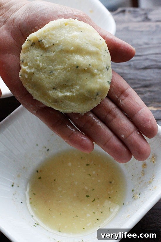 Crispy Parmesan Mashed Potato Patties from Leftovers 4 Flatten cold mashed potatoes into patties then dip in egg.
