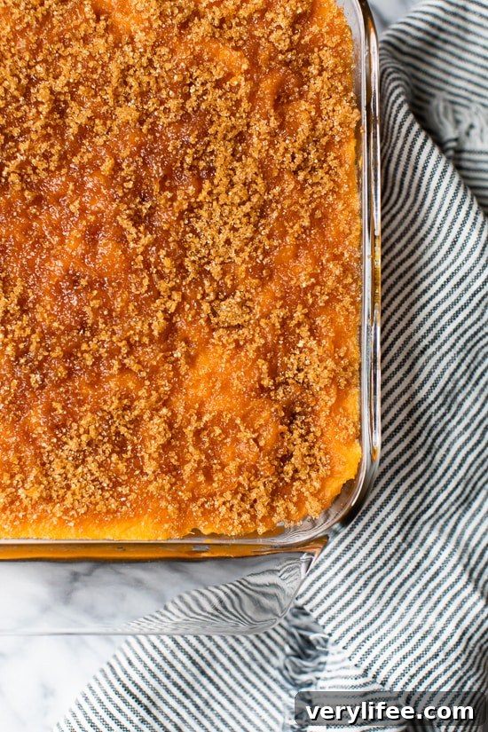 Mashed Sweet Potatoes Brulee are seasoned with with a hint of cinnamon and nutmeg topped with a caramelized brown sugar crust.