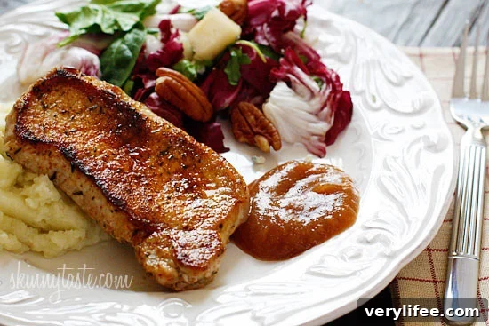 Pork chops and apple sauce with with buttermilk mashed potatoes and an Autumn Salad with Pears on the side.
