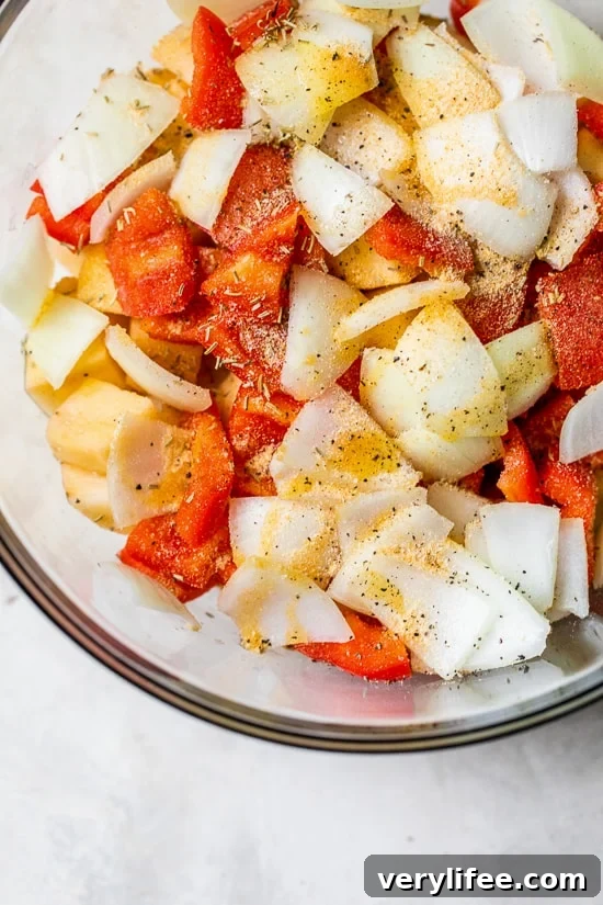 One Pan Roasted Potatoes Sausage and Peppers is one of my favorite, fuss-free sheet pan dinners. Perfect for weeknights and bonus points for easy cleanup!