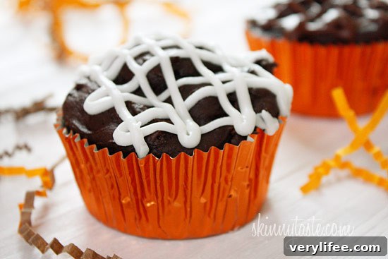 These are healthy Chocolate Mummy cupcakes with vanilla frosting, wouldn't these be so cute to bring to a Halloween party!