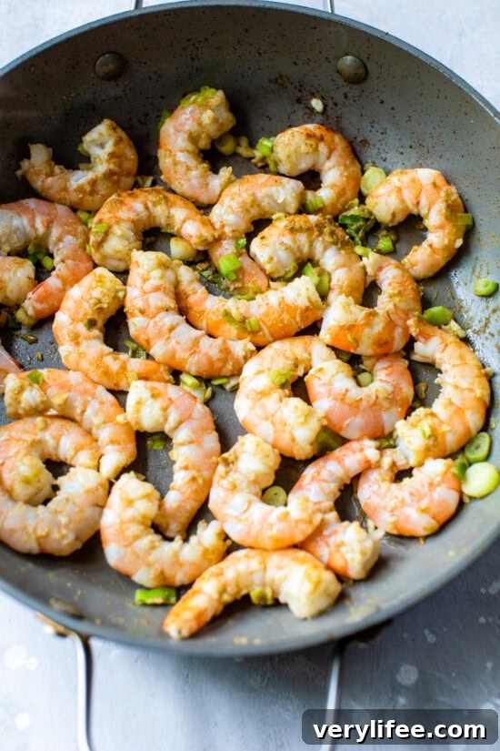 Shrimp in Thai Green Curry with Coconut Milk 6 Skillet with shrimp.