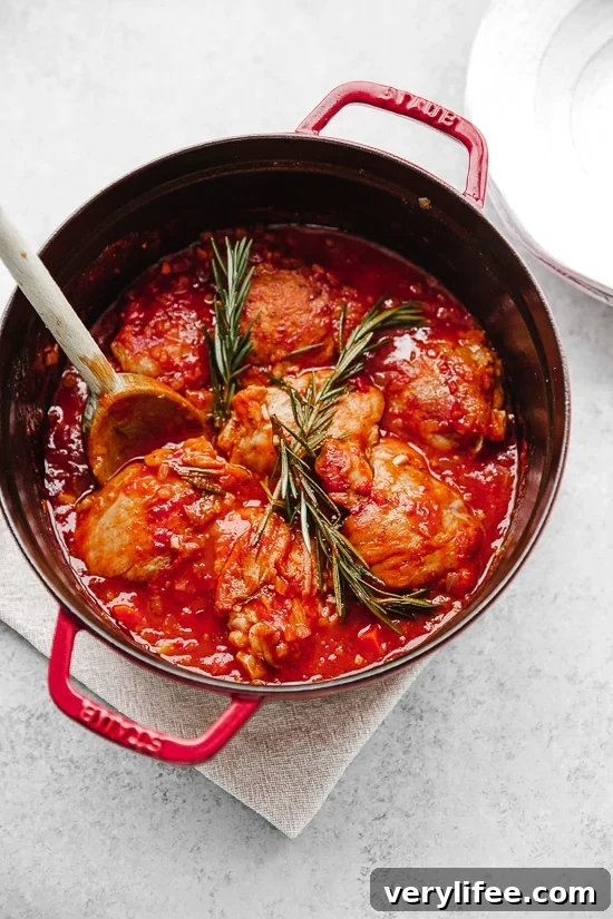 Pollo in Potacchio: Tomato and Rosemary Braised Chicken 8 Close-up of Pollo in Potacchio with tomatoes and rosemary.