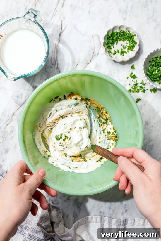 Lighter Buttermilk Ranch Dressing Recipe 4 Stirring together ingredients for buttermilk ranch dressing.