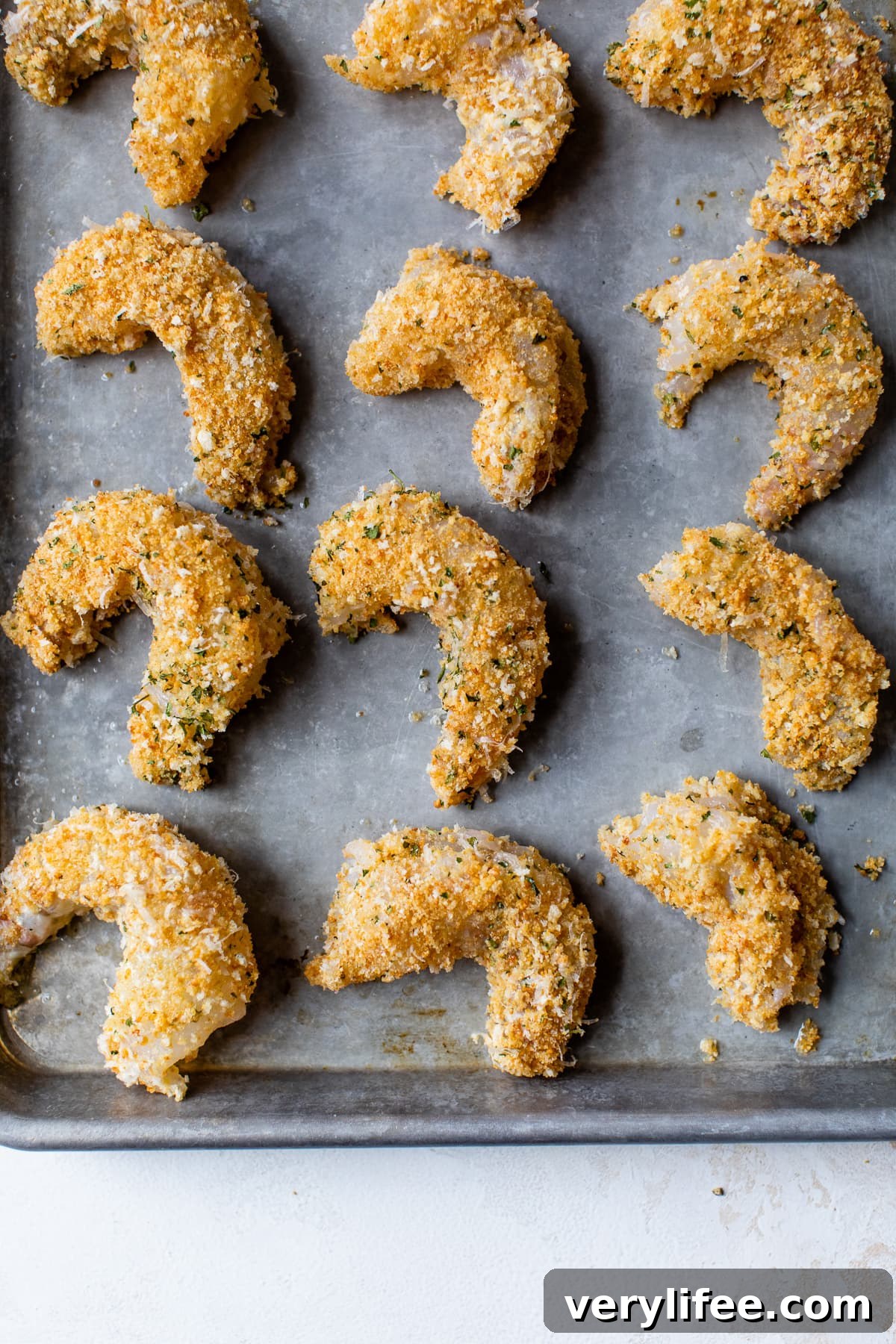 Crispy Breaded Shrimp Recipe 3 Baked breaded shrimp on a sheet pan