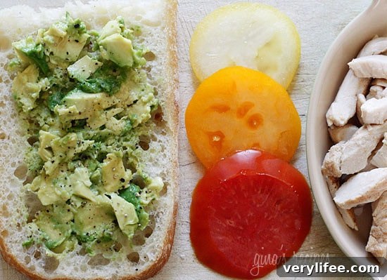 Grilled chicken sandwich with avocado and tomato