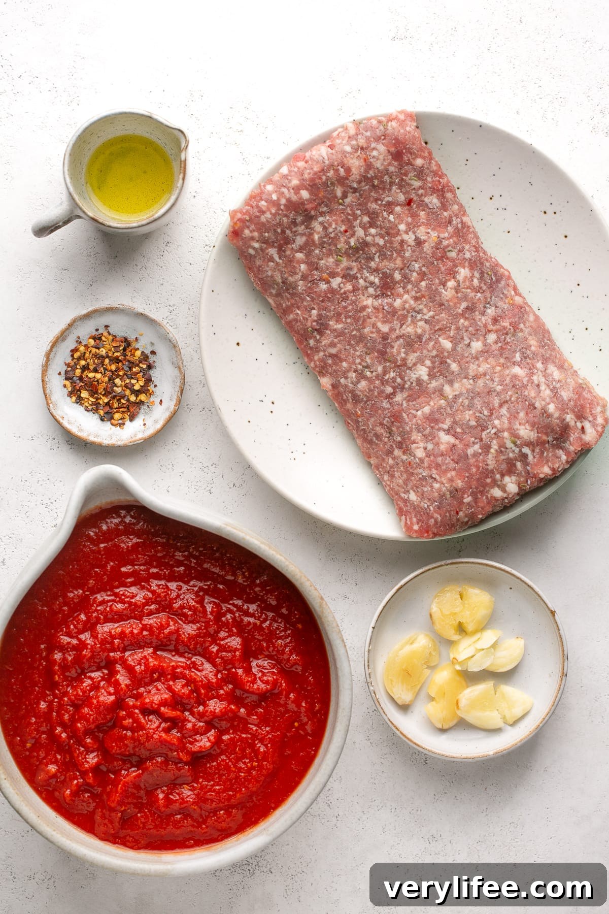 Crock Pot Sausage Pasta Sauce Recipe 4 Ingredients needed for Italian sausage pasta sauce.