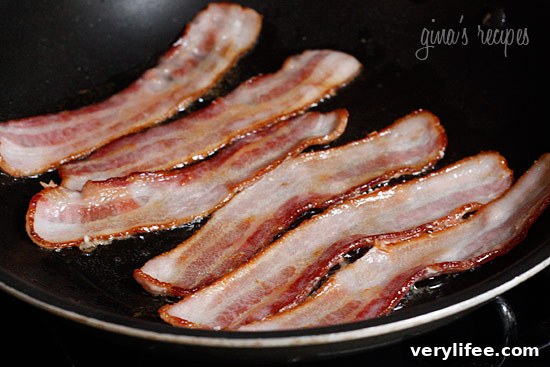 Bacon cooking in a skillet