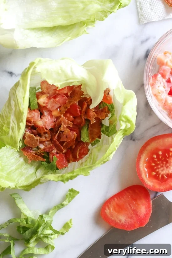 Crispy BLT Lettuce Wraps Recipe with Avocado 4 Skip the bread and enjoy all the flavors you love in a BLT, without all the carbs in these easy lettuce wraps! So easy and seriously satisfies my BLT cravings. Add some avocado if you wish!