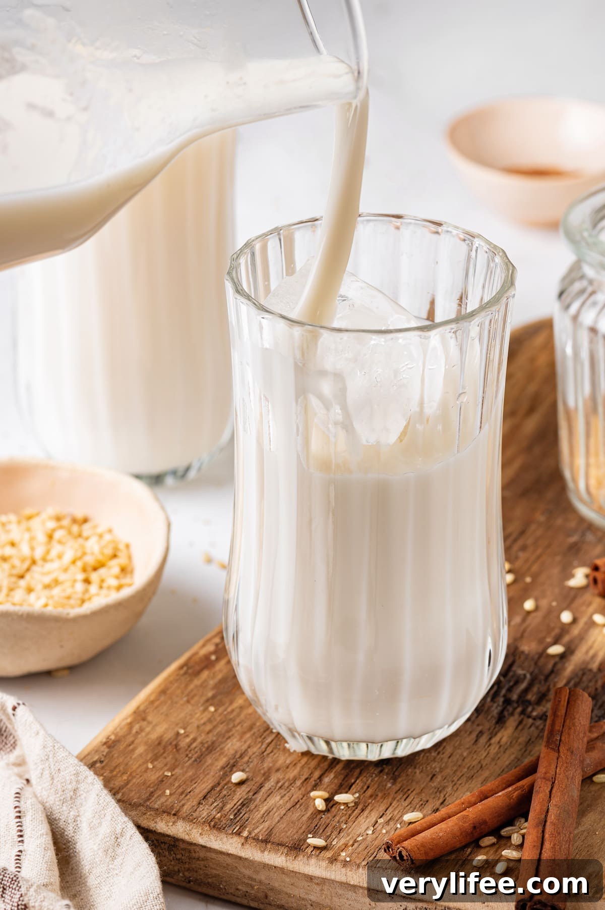 Horchata being poured into a glass