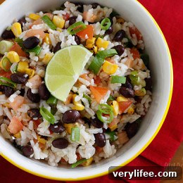 Fiesta Lime Rice in a bowl with cilantro garnish
