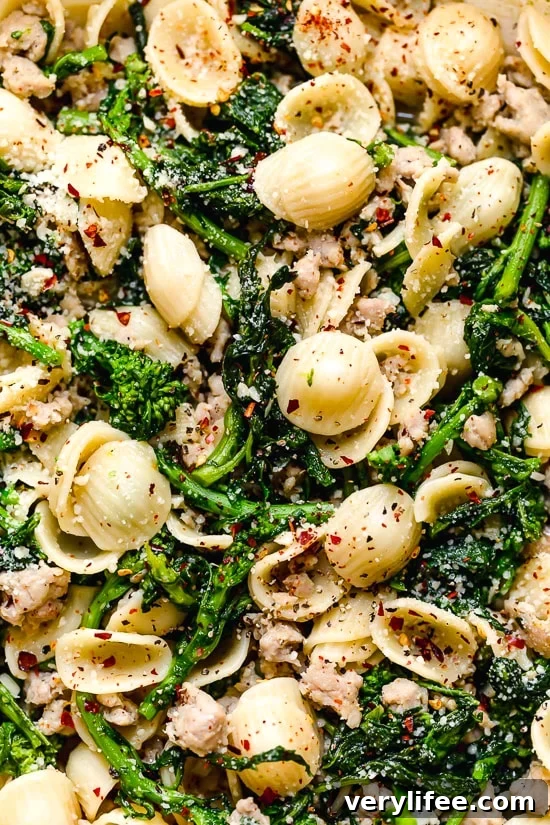 Orecchiette with Sausage and Broccoli Rabe Recipe 3 Orecchiette Pasta with Sausage and Broccoli Rabe uses chicken sausage in place of pork and a whole lot of garlic! This lightened up version will not disappoint!!