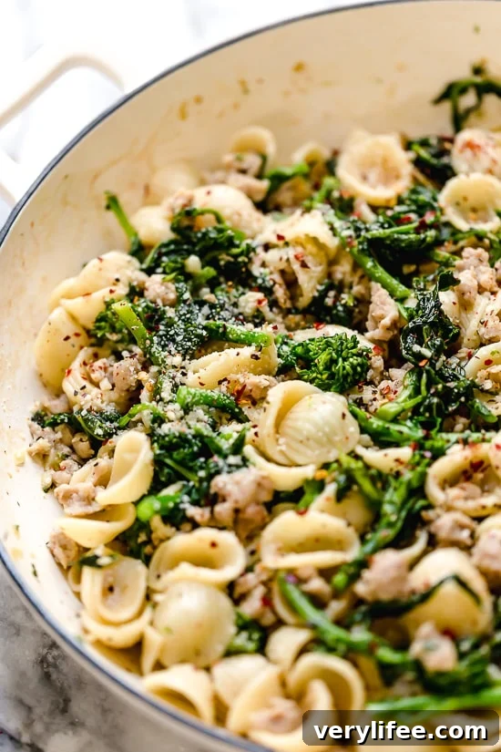 Orecchiette with Sausage and Broccoli Rabe Recipe 6 Orecchiette Pasta with Sausage and Broccoli Rabe uses chicken sausage in place of pork and a whole lot of garlic! This lightened up version will not disappoint!!