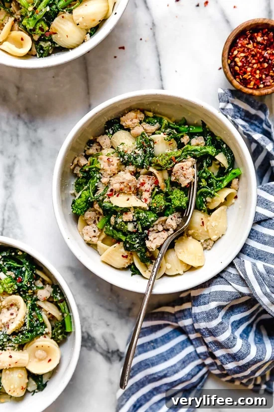 Orecchiette with Sausage and Broccoli Rabe Recipe 8 Orecchiette Pasta with Sausage and Broccoli Rabe uses chicken sausage in place of pork and a whole lot of garlic! This lightened up version will not disappoint!!