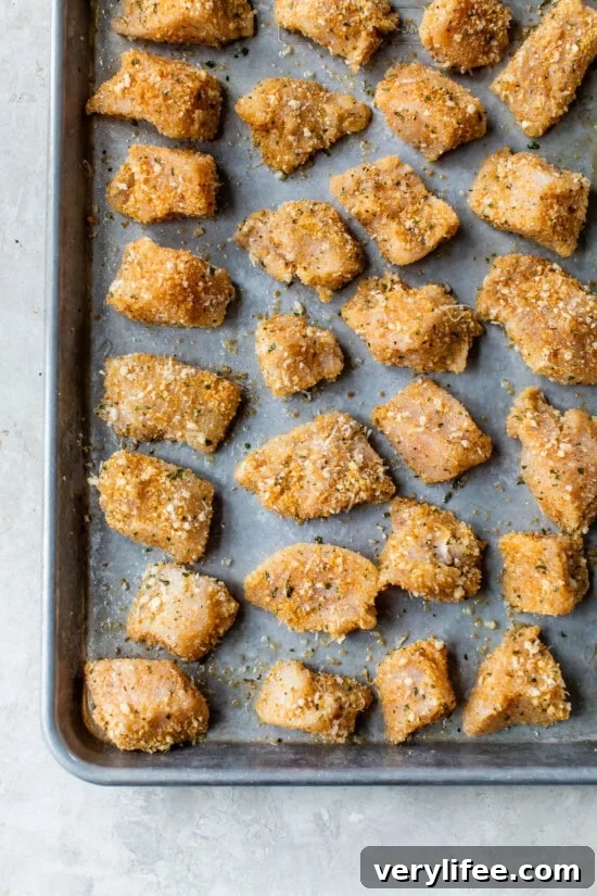 Crispy Oven-Baked Chicken Nuggets 7 Place Baked Chicken Nuggets on a sheet pan and bake.