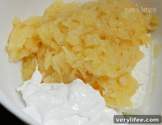 Pineapple fluff frosting on cupcakes