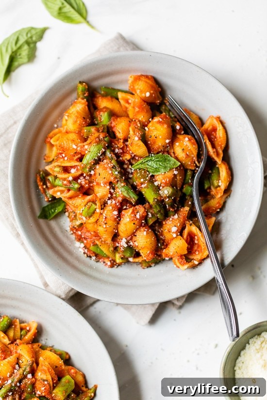 Asparagus Pasta with Marinara Sauce 2 Baby Pasta Shells with Asparagus and Marinara Sauce is a quick and easy 4-ingredient pasta dish, perfect for Spring. Ready in under 15 minutes and under ten dollars to make.
