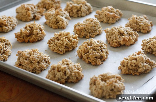 Freshly baked banana nut oatmeal cookies on a cooling rack