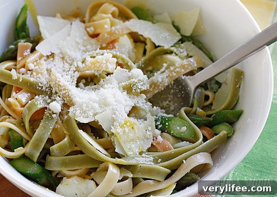 Asparagus poached eggs over linguini