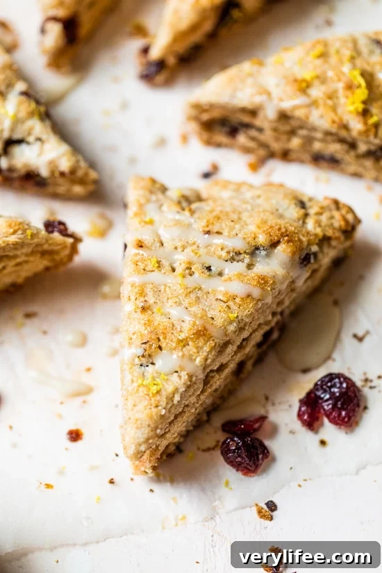 Buttery Lemon Cranberry Scones Recipe with Zesty Glaze 3 Lemon Cranberry Scones with icing