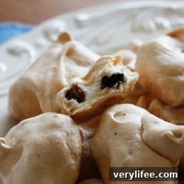 Black-and-White Chocolate Chip Meringues Recipe 2 Black and white chocolate chip meringue cookies are perfect for your sweet tooth. They're light, airy, melt in your mouth, low fat, gluten-free and delicious!