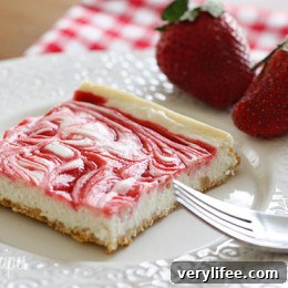 Strawberry Swirl Cheesecake – A low fat cheesecake swirled with strawberry jam on a graham cracker crust.