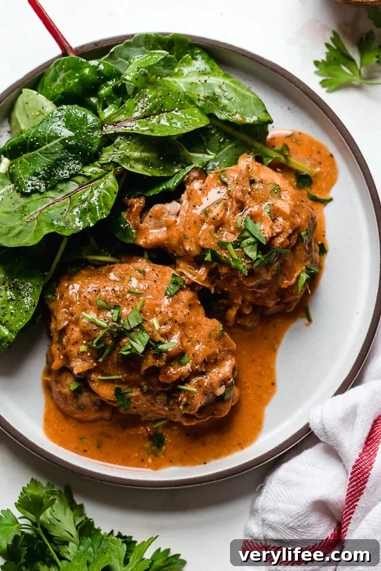 I lightened up this popular French chicken dish known as Poulet Au Vinaigre, which is made with chicken thighs and shallots cooked in red wine vinegar and white wine.