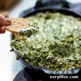 Slice of bread with hot spinach dip