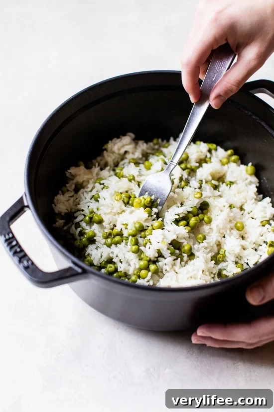 Fluffing rice with a fork