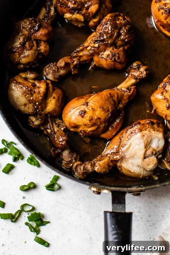 Sticky Asian Glazed Chicken Drumsticks Recipe 5 Asian chicken drumsticks in a skillet